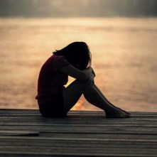 woman-sad-near-water